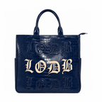 Navy blue crocodile textured utility bag with cream LODB Gothic lettering