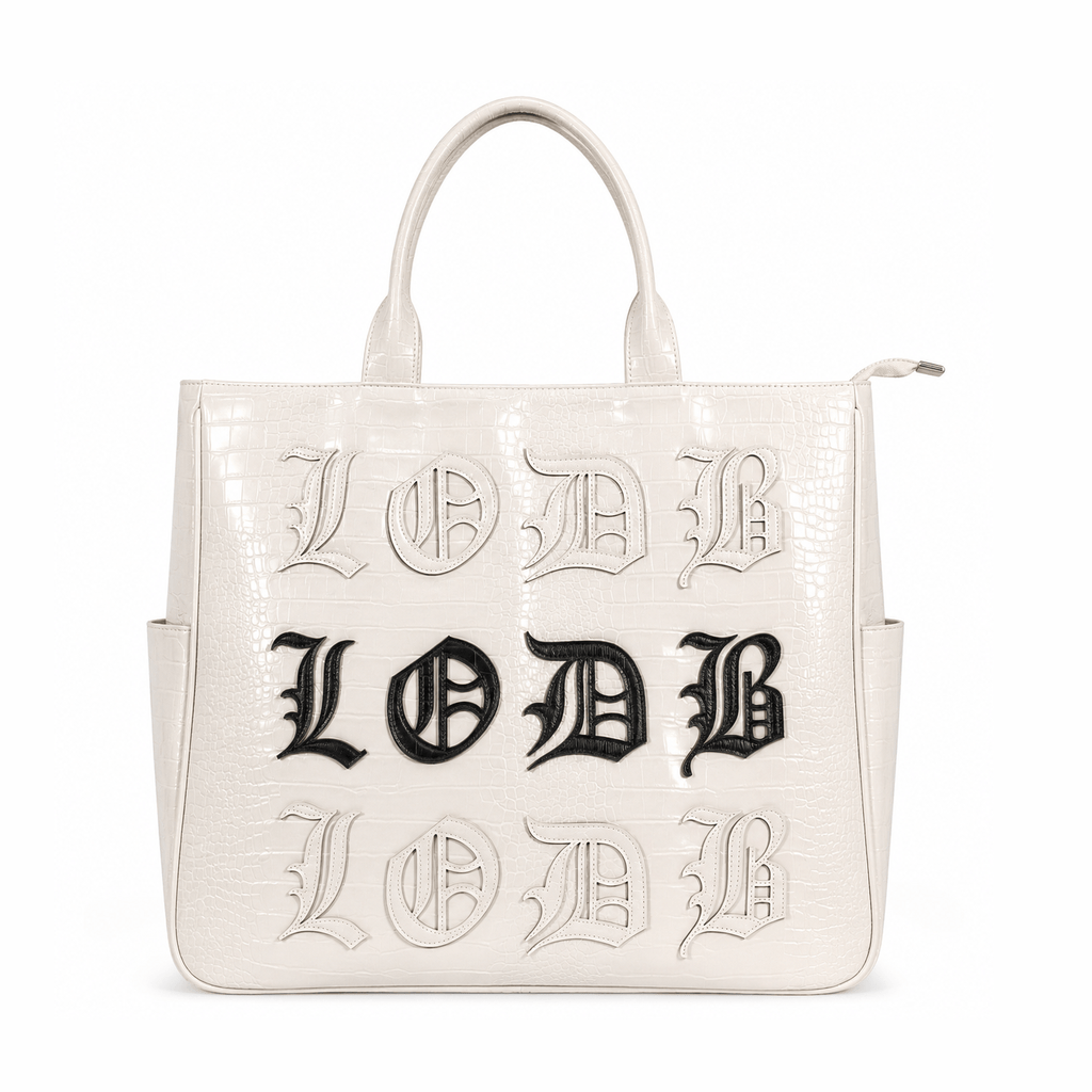 Cream-colored vegan alligator 3-in-1 utility bag with black and white LODB text