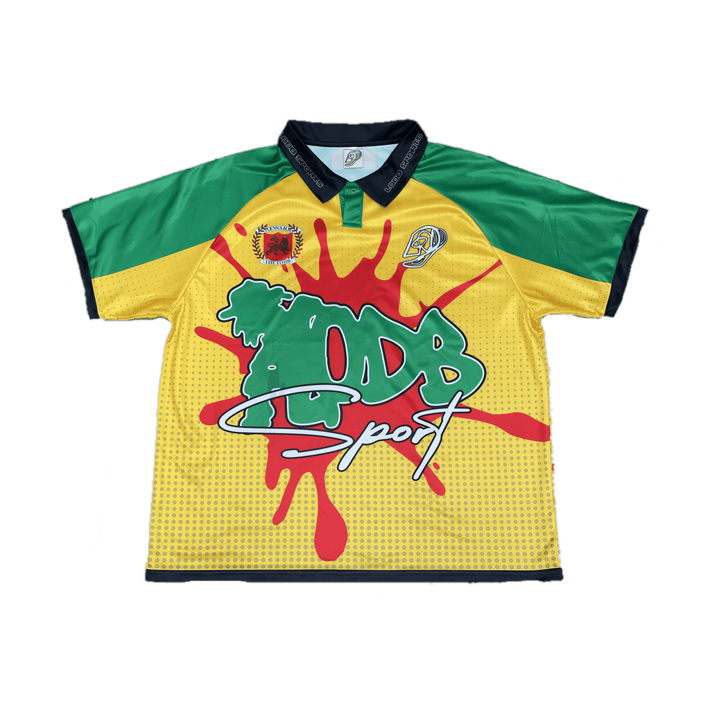 Flat lay LODB Black Stars polo jersey showing green panels and red splatter design