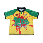 Flat lay LODB Black Stars polo jersey showing green panels and red splatter design