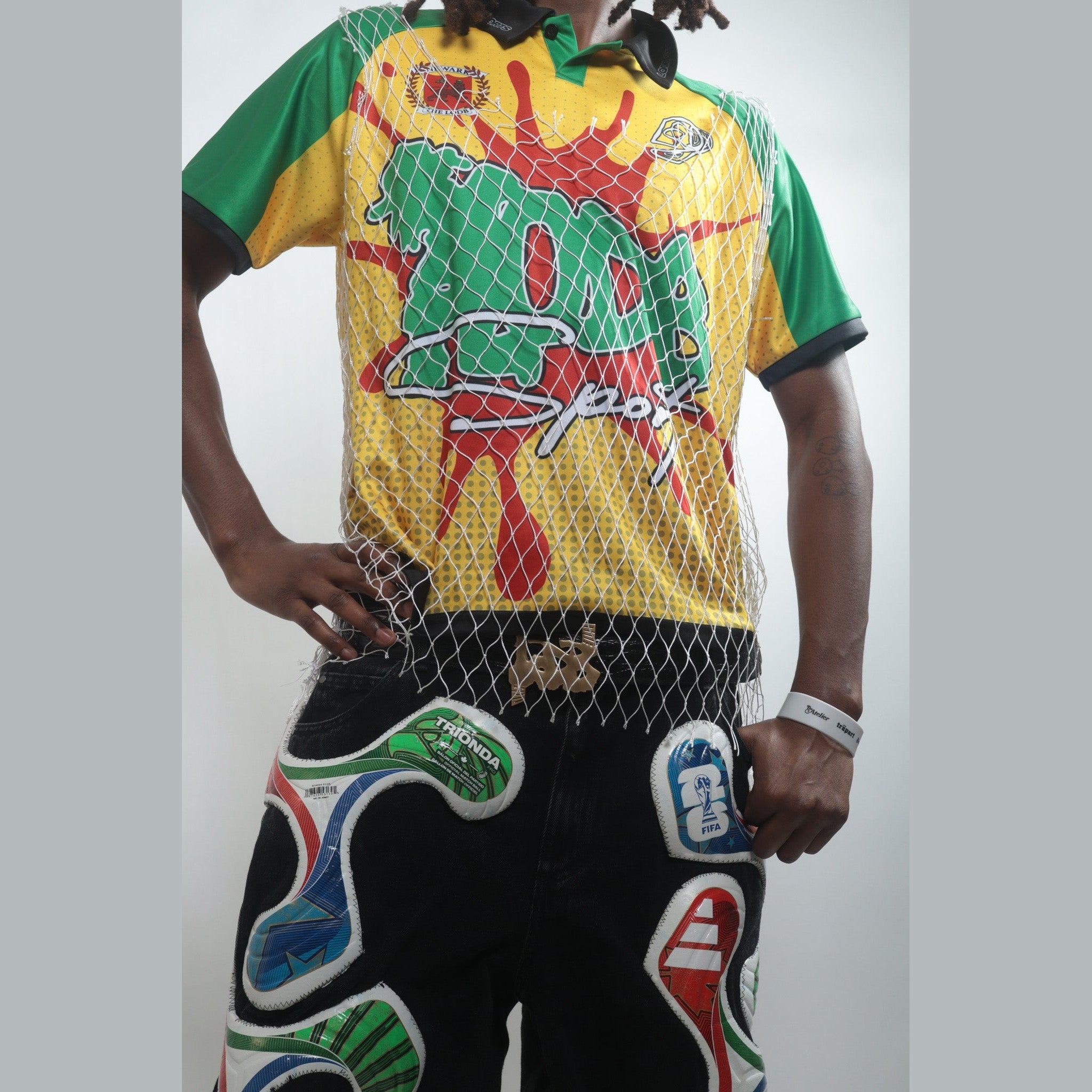 LODB Black Stars yellow green black polo jersey front view with Sport text and mesh overlay