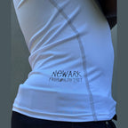Close-up of white performance tank fabric texture and NEWARK FASHION DISTRICT print