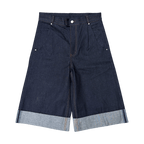 LODB drop-crotch raw denim shorts on model with bell-bottom hem