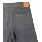 LODB raw denim shorts leather tag detail and twill texture close-up