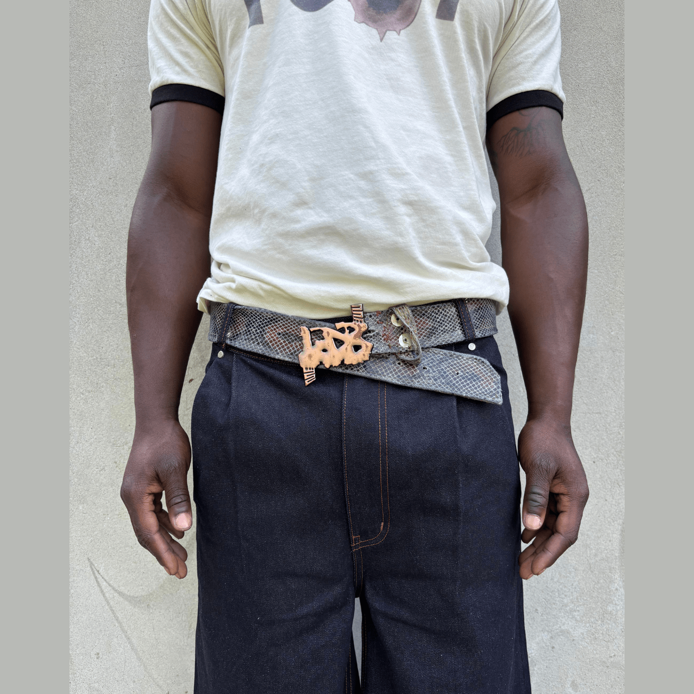 LODB snakeskin belt with copper buckle on model